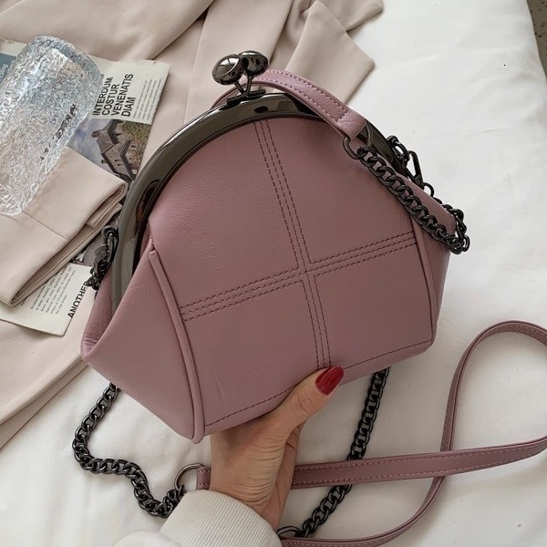 2025 Autumn new solid color shell large capacity handbag niche design fashionable women s shoulder bag new women s crossbody bag fashion Autumn new de