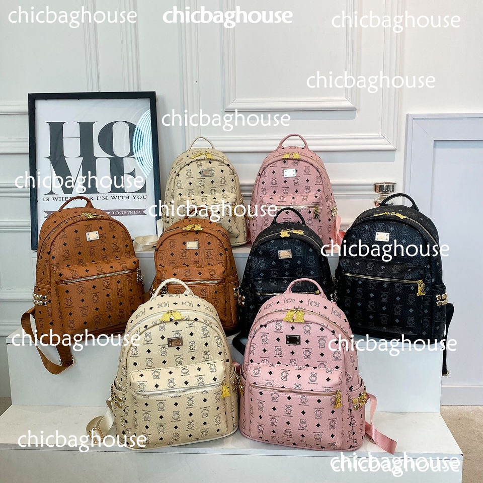 2025 new Leather Handbag Backpack Large Size Men And WomenRivet Printing Lady Bags Boy Girl School Bag Senior Sense High bag 245 0