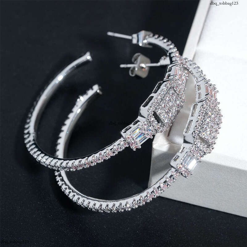 ICED OUT Hot-Selling Sier Micro-Inlaid Hollow Cubic Zirconia Fashionable Versatile Earrings