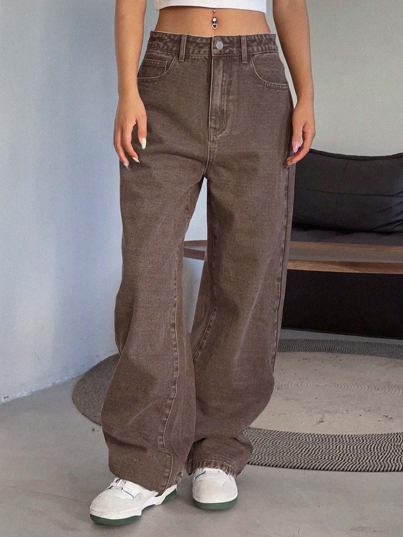 Lady's brown high-waisted wide-leg jeans