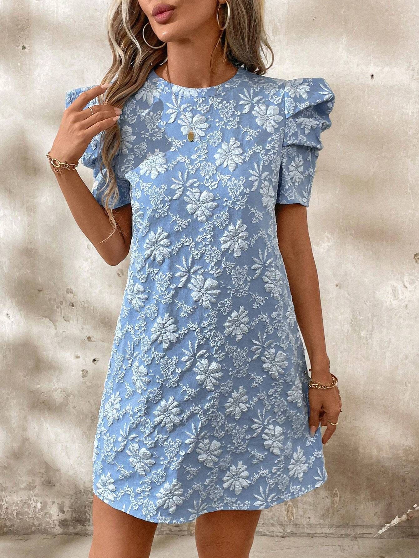 Lady's blue jacquard dress with puff sleeves