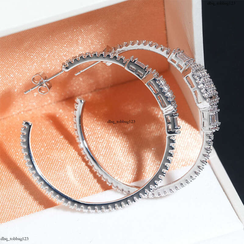 ICED OUT Hot-Selling Sier Micro-Inlaid Hollow Cubic Zirconia Fashionable Versatile Earrings