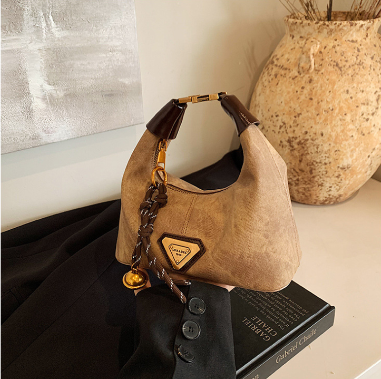Free shipping autumn and winter super popular niche women's bag, 2025 new style, fashionable and versatile design, crossbody dumpling bag, exquis