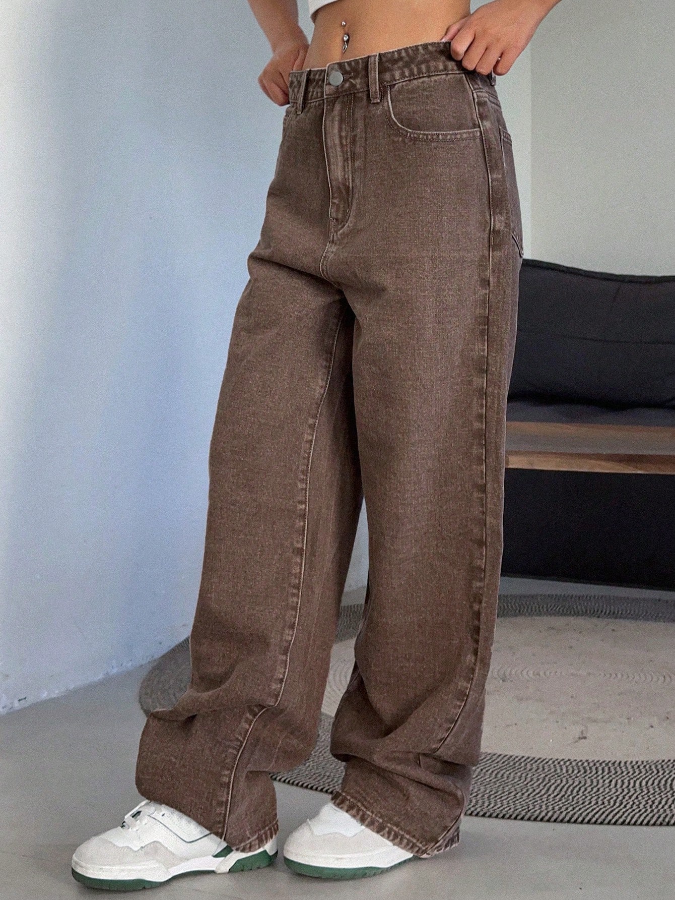 Lady's brown high-waisted wide-leg jeans