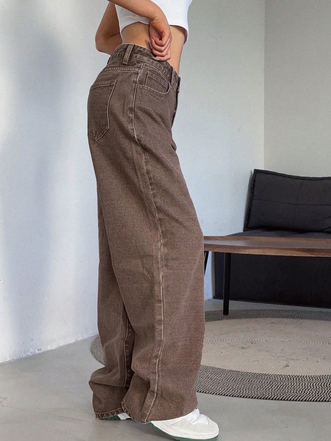 Lady's brown high-waisted wide-leg jeans