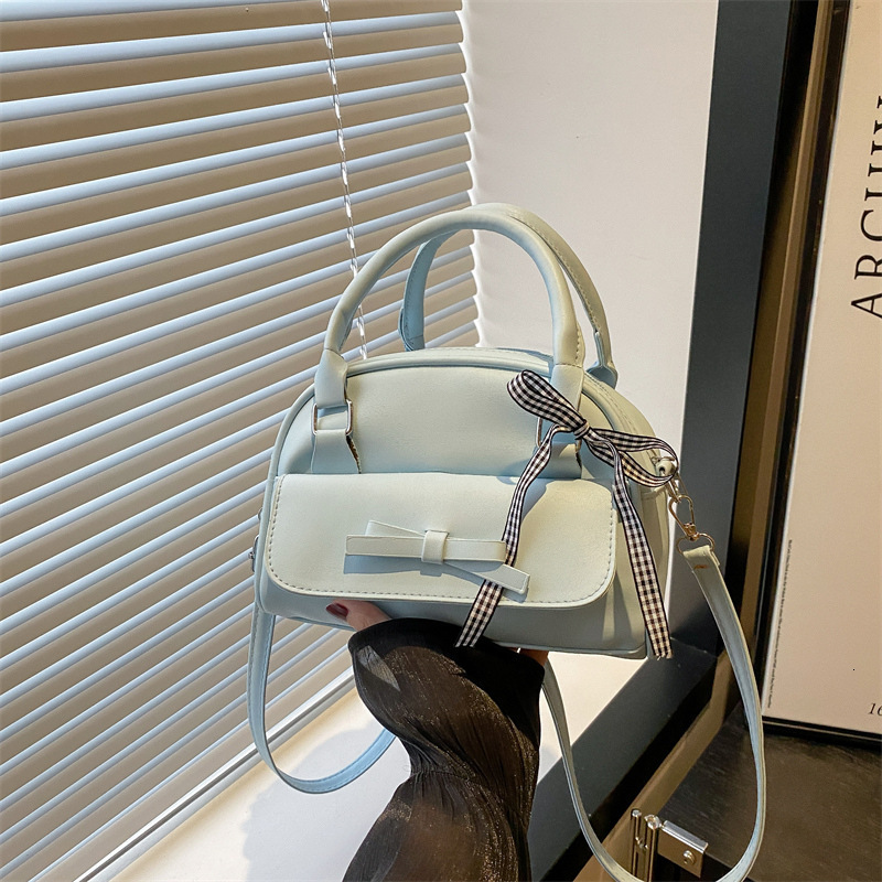 2025 Autumn New Shell Bag Women s trend Shoulder Niche Design Fashion Style Bow PU Leather Simple Crossbody Designer Handbag