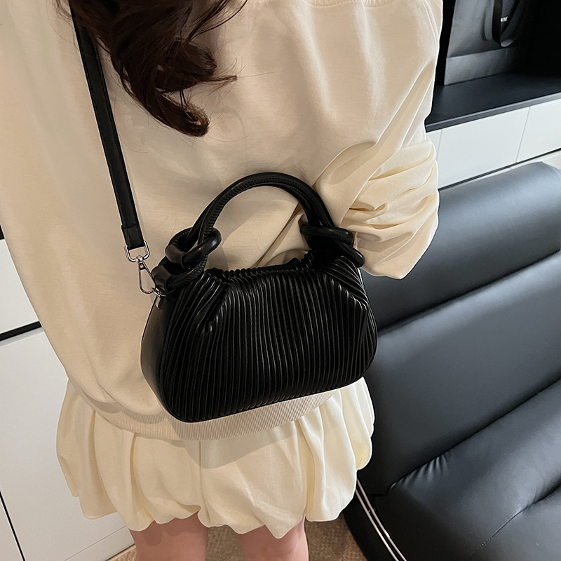 2025 Autumn New Women s Textured Vertical Striped Handbag Fashionable Niche Design Women s Crossbody Bag New Women s fashion Shoulder Bag Autumn New D