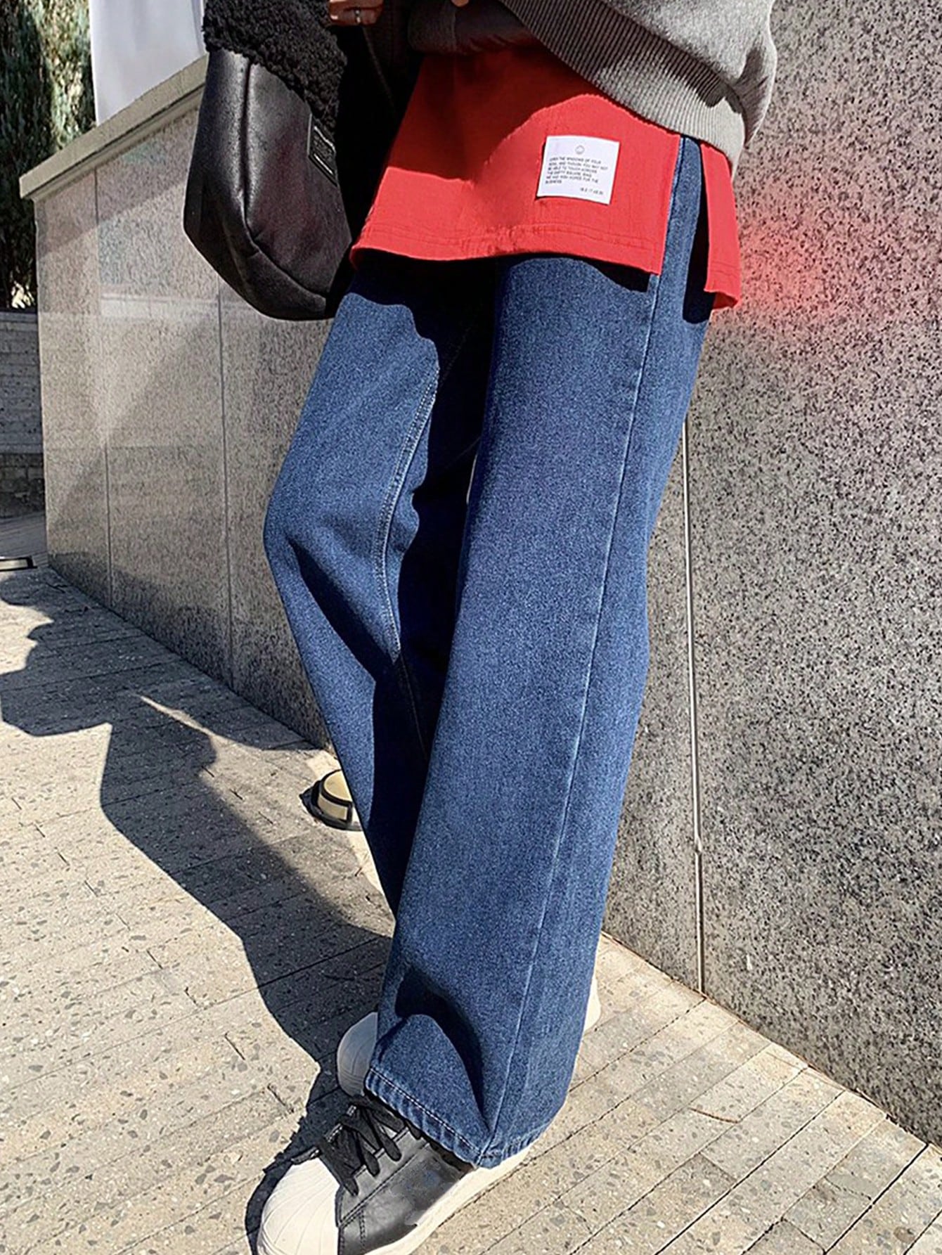 Lady's deep blue high-waisted wide-leg jeans