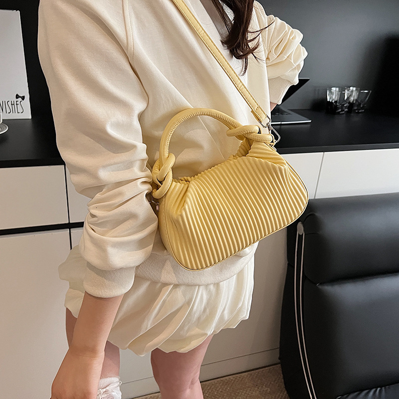 2025 Autumn New Women s Textured Vertical Striped Handbag Fashionable Niche Design Women s Crossbody Bag New Women s fashion Shoulder Bag Autumn New D