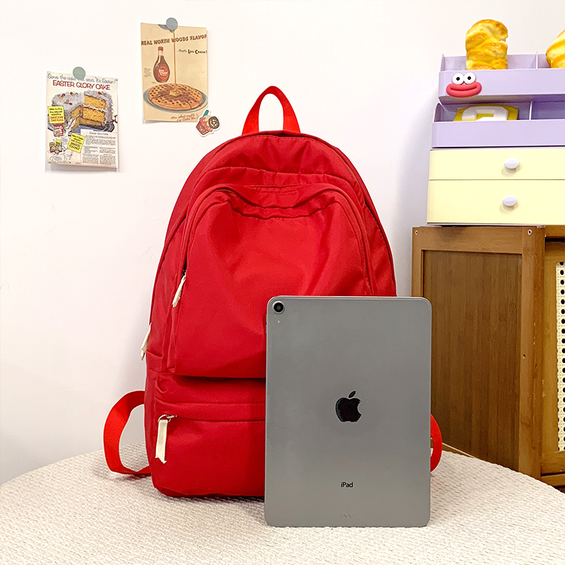 New large-capacity commuter backpack, fashionable and versatile school bag, casual and simple junior high school backpack