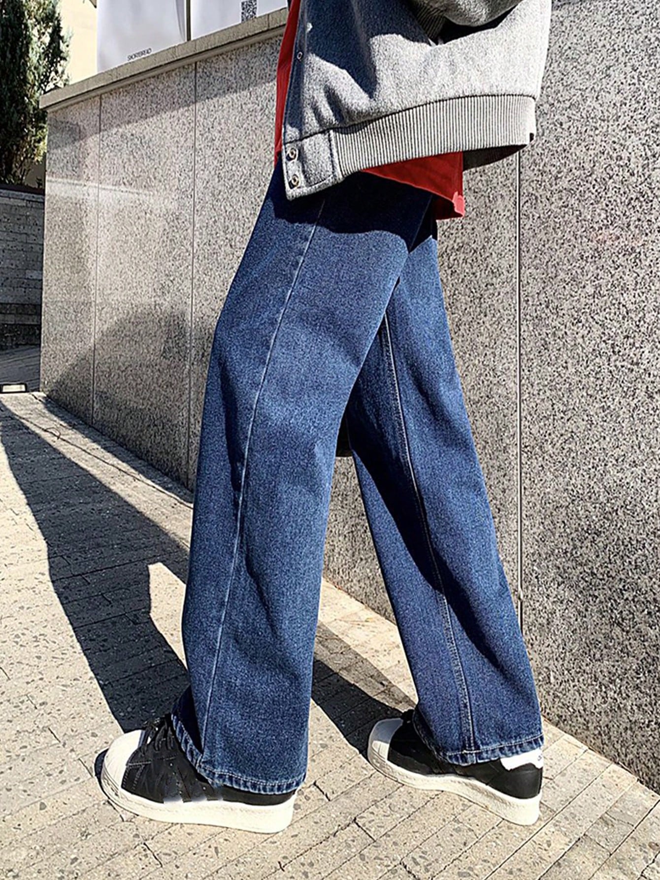 Lady's deep blue high-waisted wide-leg jeans