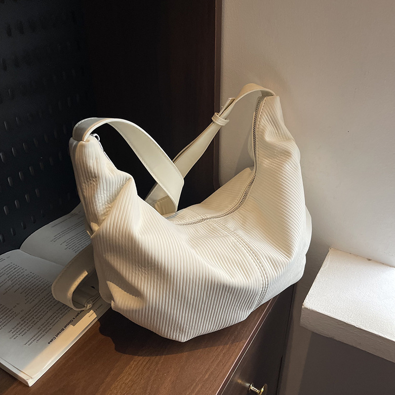 Cross-border Wholesale New Korean Designer Bag Niche Single Shoulder Underarm Bag Retro Crossbody Dumpling Bag Women's Single Luxury Bag Shoulder