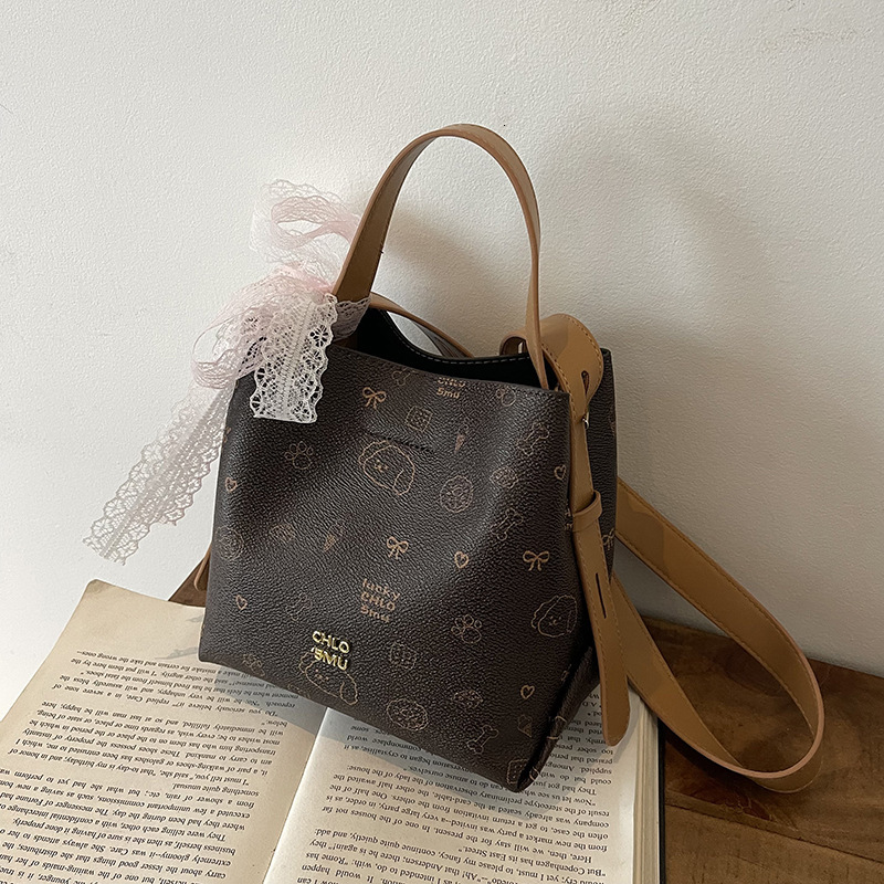 New Women's Cartoon Cylinder Bag Designer Bag Fashion Versatile Handbag Cross-border Wholesale Shoulder Bag Luxury Bag Simple Retro Crossbody Bag