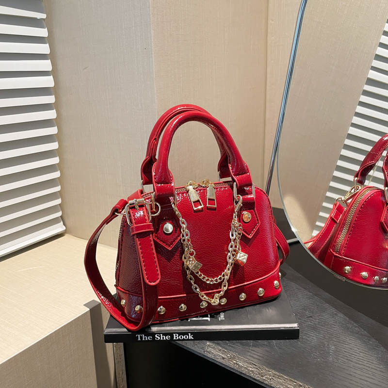 Free Shipping Designer Bag Luxury Bag High-end Rivet Shoulder Bag For Women 2025 Summer New Crossbody Bag Simple Fashion Mini Handbag Shell Bag