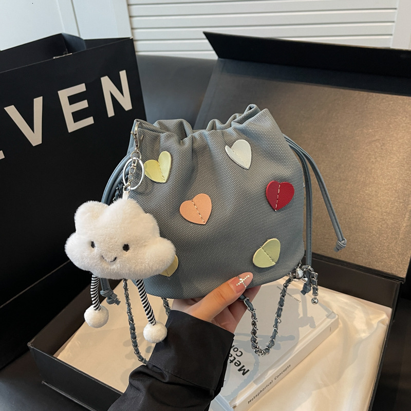 Women's Bag 2025 New Solid Color Chain Luxury Bag Designer Bag Strap Pendant Bucket Bag Simple Stylish Fashion Versatile Shoulder Bag Crossbody B