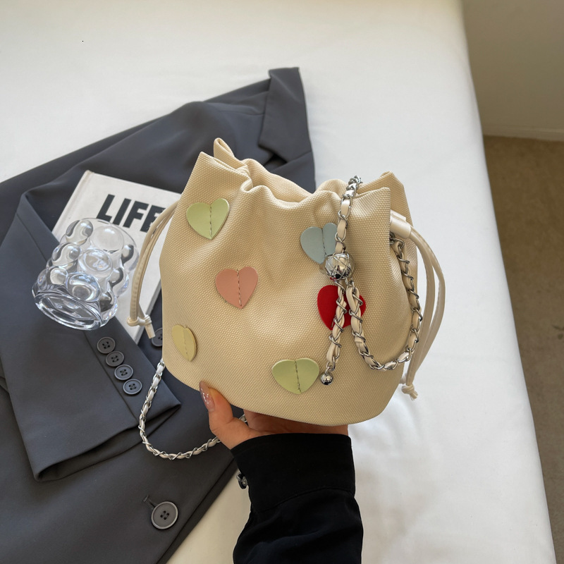 Women's Bag 2025 New Solid Color Chain Luxury Bag Designer Bag Strap Pendant Bucket Bag Simple Stylish Fashion Versatile Shoulder Bag Crossbody B
