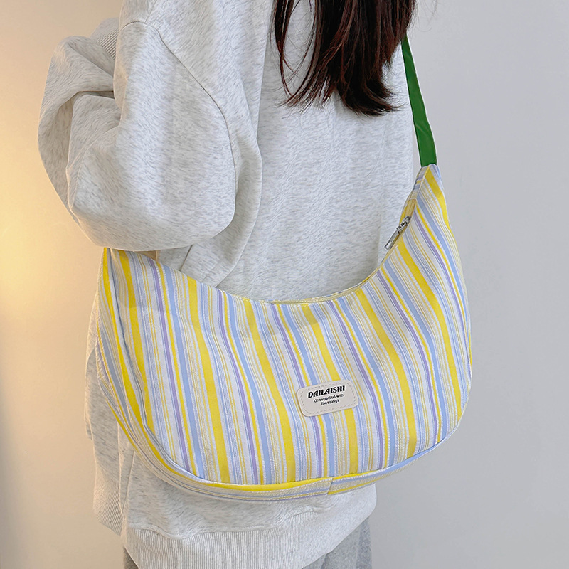 New Women's Canvas Trendy Designer Bag 2025 Fashion Popular Shoulder Bag Large Capacity Tutoring Commuting Crossbody Luxury Bag Dumpling Bag