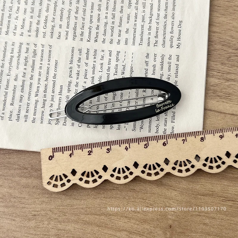 South Korean FRANCE hollow out oval temperament bangs clip small black broken hair side clip top clip hair accessories 250807