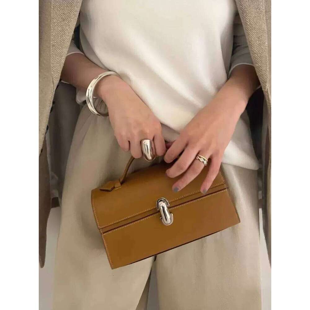 High end light women s bag folding genuine leather handbag hand held small square French minimali