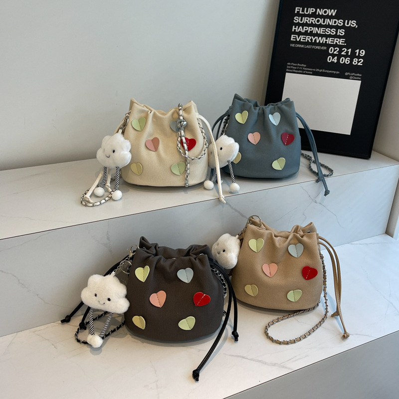 Women's Bag 2025 New Solid Color Chain Luxury Bag Designer Bag Strap Pendant Bucket Bag Simple Stylish Fashion Versatile Shoulder Bag Crossbody B