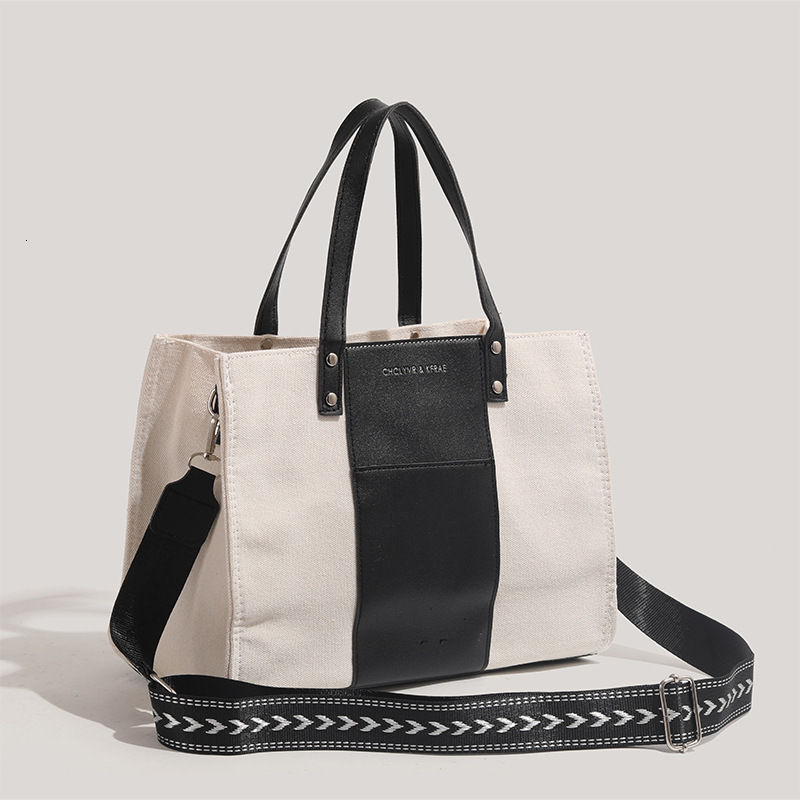 2025 New Black and White Tote Canvas Large Capacity Student Class Commuting Crossbody Bag ddmymoon