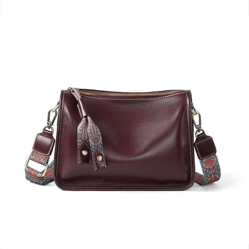 Summer 2024 new cowhide light niche high-end design messenger women's versatile shoulder bag women