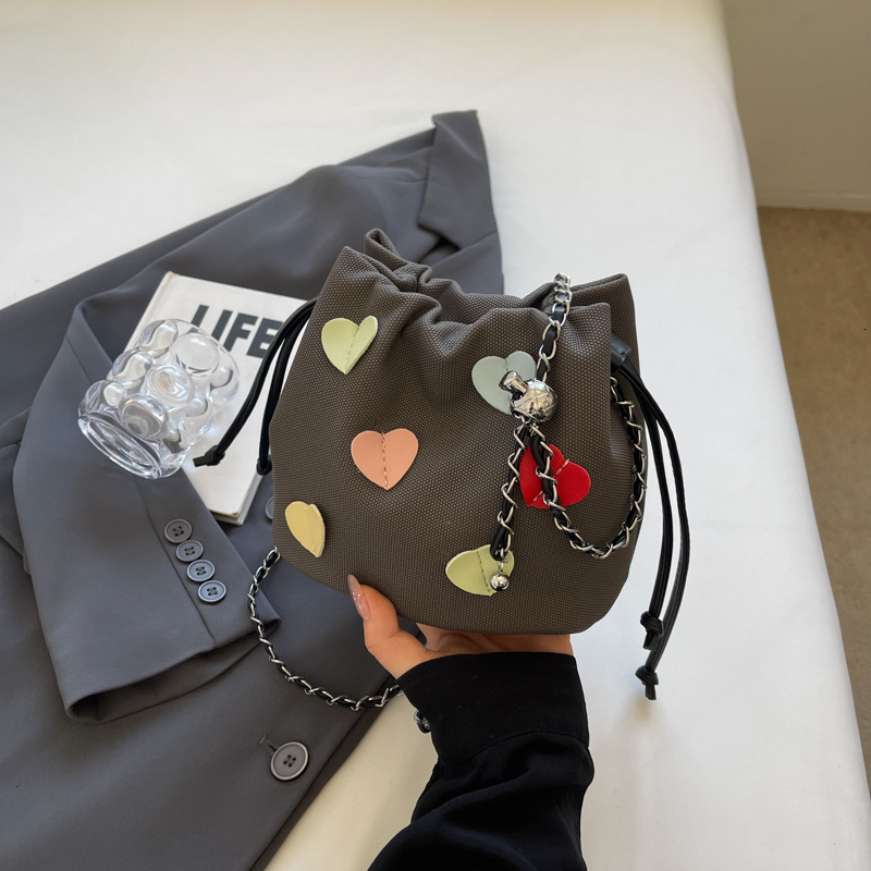 Women's Bag 2025 New Solid Color Chain Luxury Bag Designer Bag Strap Pendant Bucket Bag Simple Stylish Fashion Versatile Shoulder Bag Crossbody B