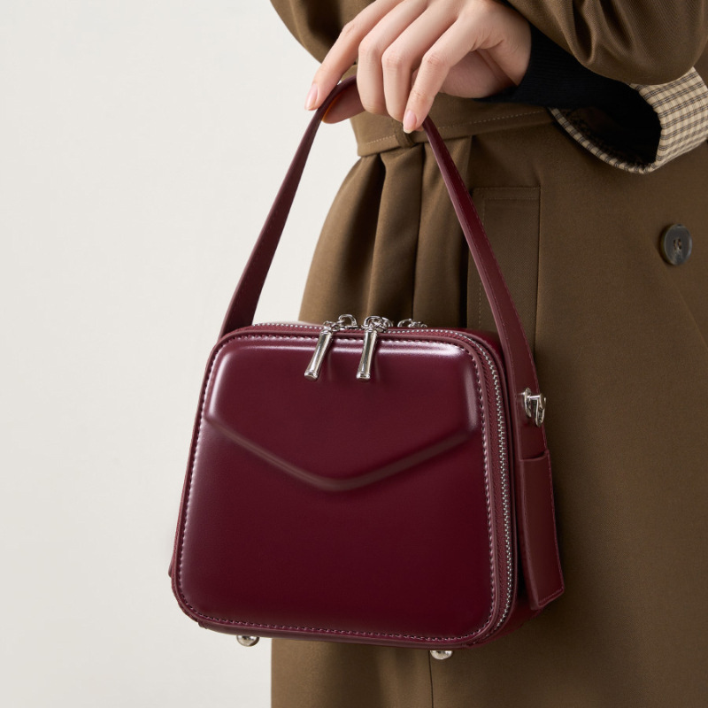 25 Spring Summer New Niche Design Ear-Hanging Series Handheld Brim Genuine Leather Women's Commuter Crossbody Bag