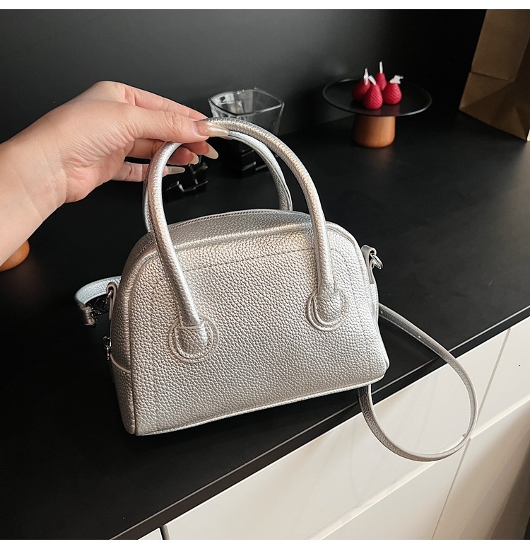 Korean Version 2025 Designer Bag New Handheld Bowling Bag Casual Versatile Fresh Single Luxury Bag Shoulder Crossbody Boston Pillow Bag