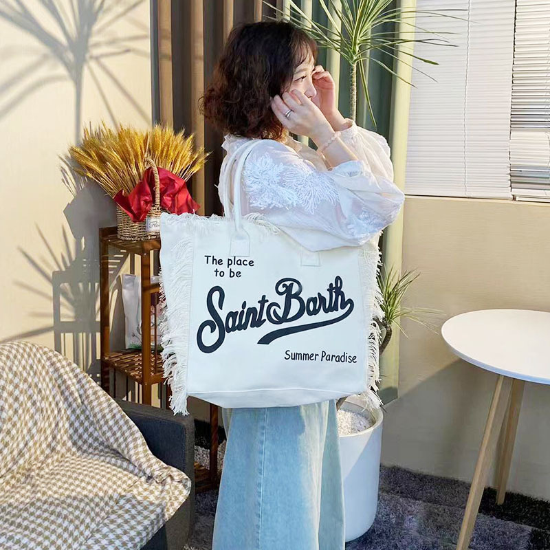 2025 Free Shipping New European And American Women's Design Handbag Large Capacity Shoulder Bag Handmade Tassel Denim Printed Tote Bag Wallet