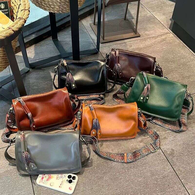 Summer 2024 new cowhide light niche high-end design messenger women's versatile shoulder bag women