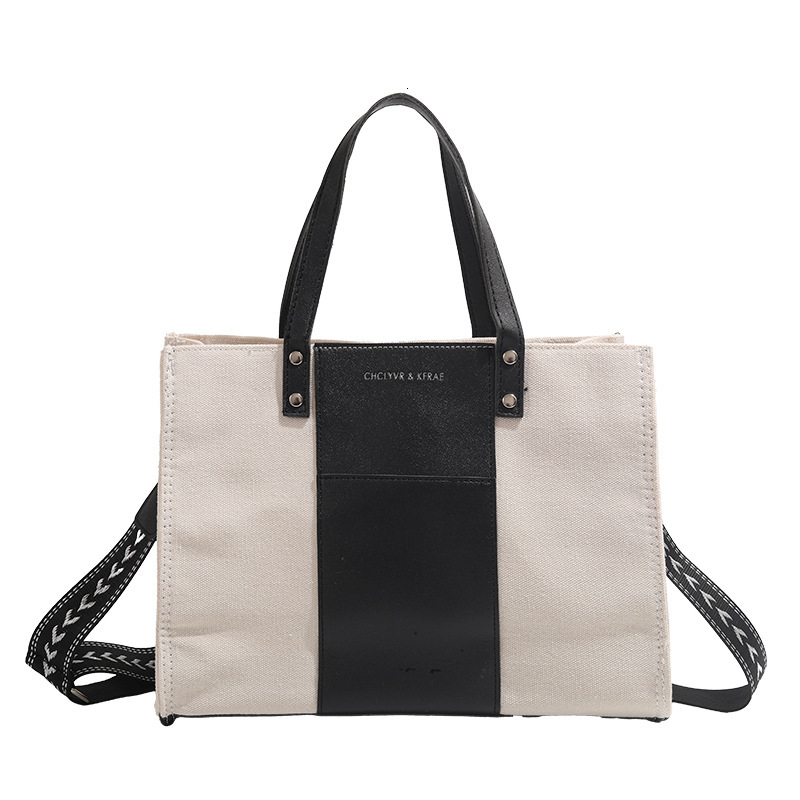 2025 New Black and White Tote Canvas Large Capacity Student Class Commuting Crossbody Bag ddmymoon