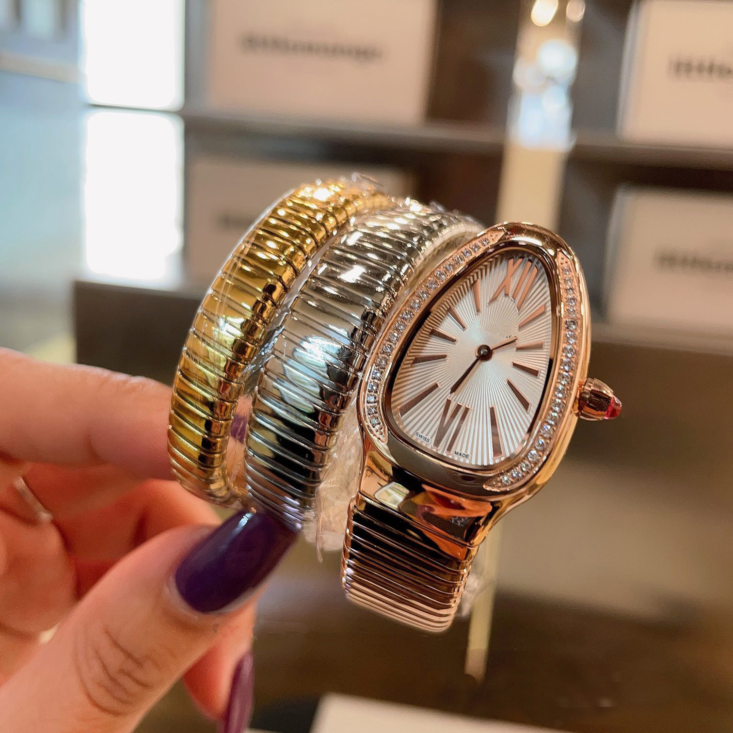 Designer watch serpentine titanium diamond steel design high quality watches with gold metal winding design for woman girls Christmas gift