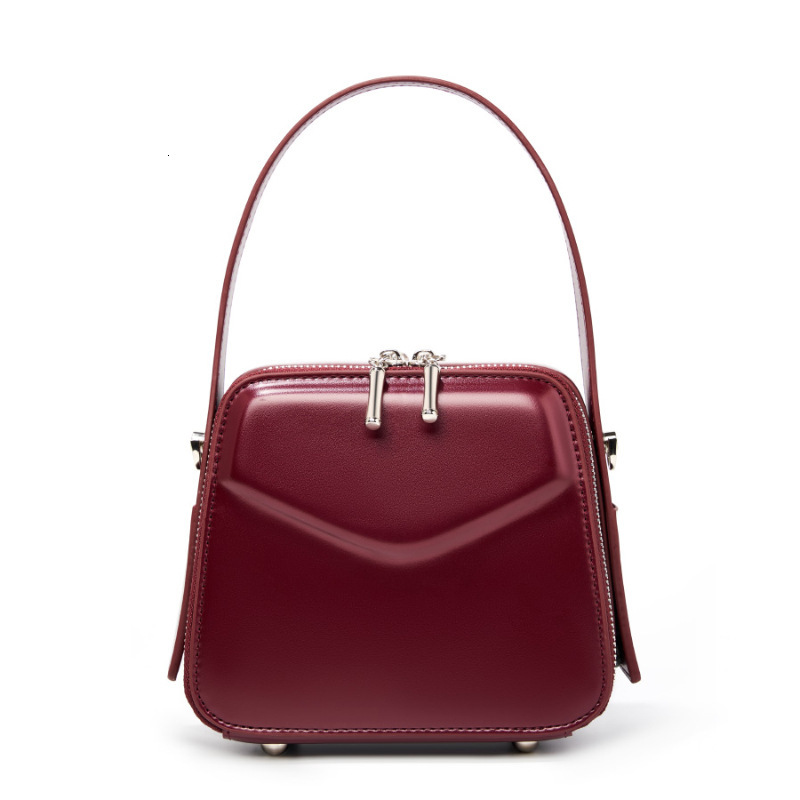 25 Spring Summer New Niche Design Ear-Hanging Series Handheld Brim Genuine Leather Women's Commuter Crossbody Bag