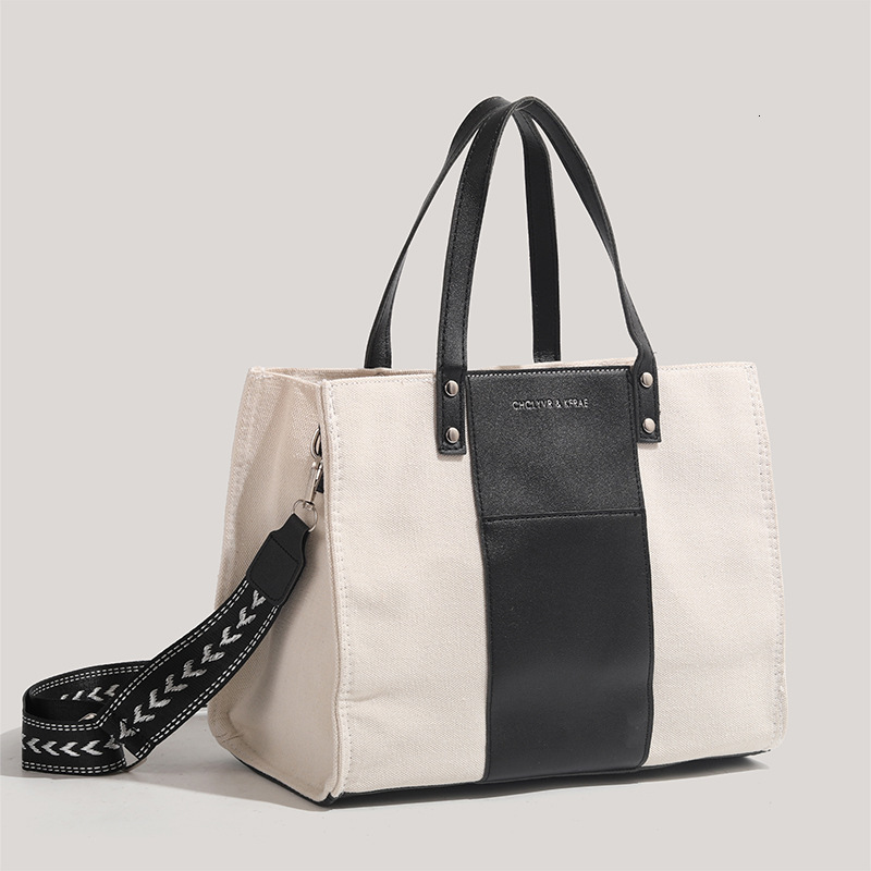 2025 New Black and White Tote Canvas Large Capacity Student Class Commuting Crossbody Bag ddmymoon