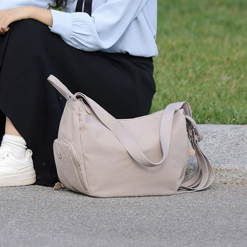 Hot Selling New Niche Casual Lightweight Simple Commuting Small Backpack Multifunctional Fashion Versatile Single Shoulder Crossbody Bag Designer Bags