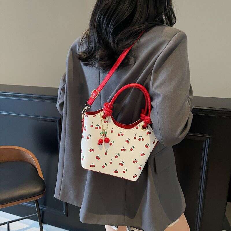 designer leisure Design 2025 New Trendy Fashion Cherry Print Crossbody Bucket Color-Block Texture Shoulder Bag