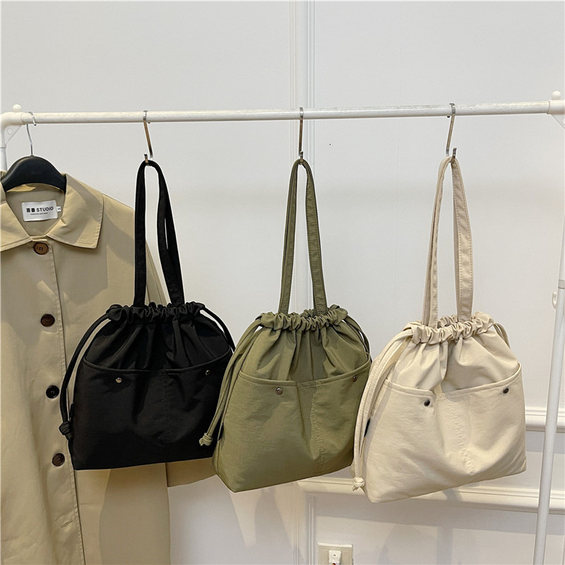 New Drawstring Nylon Underarm Design Handheld Bucket Large Capacity Shoulder Bag Trendy Versatile Commuting