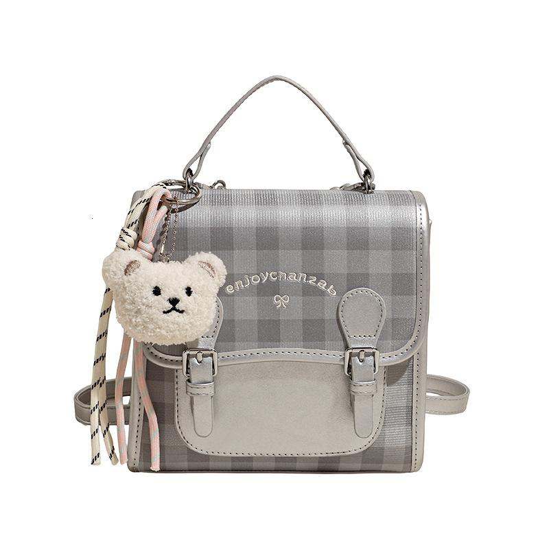 2025 High-end Fashion Cute Youthful Plaid Bag Large Capacity Commuter with Pendant Handheld Backpack for Women ddmymoon