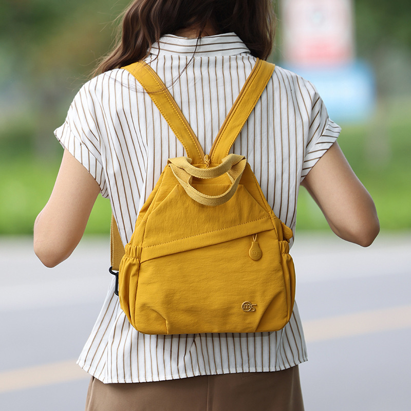 Multifunctional Women's New Lightweight Waterproof Nylon Cloth Travel Small Backpack Commuting Crossbody Chest Bag ddmymoon