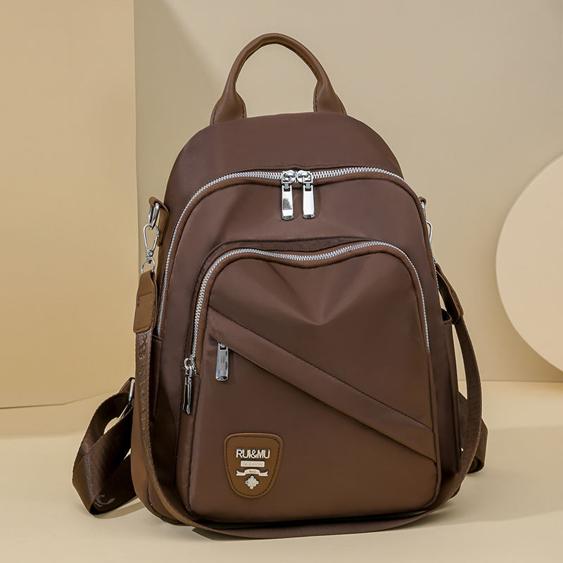 Casual for Women 2025 New Lightweight Travel Student Bag Fashionable High-end Oxford Cloth Women's Backpack ddmymoon