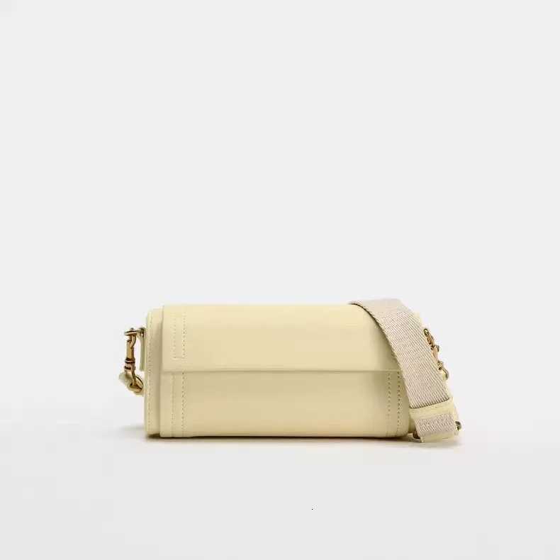 Autumn New Womens Bag Vanilla Yellow Flip Cover Versatile Commuting Cylindrical Bag Cylindrical Shoulder Crossbody Bag Z250811