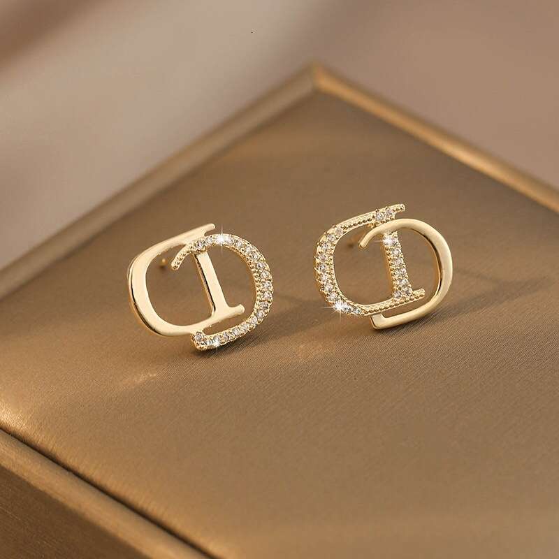 DHcollections Letter CD Ins Style Rhinestone Hollow Socialite Light S Pure Sier Needle Earrings for Women
