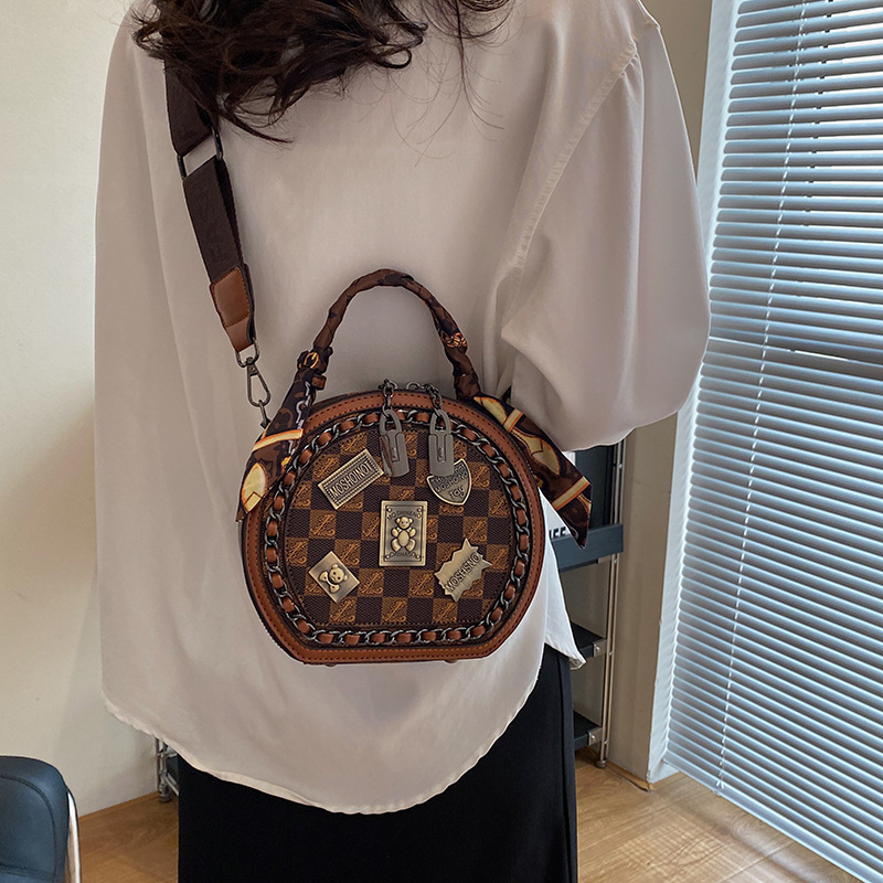 free shipping designer bags Luxury Bags Fashionable metal patch Bear metal brand small round bag with exquisite patterns