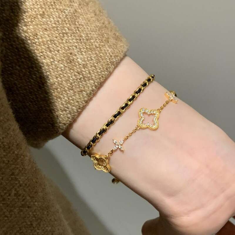 Luxury jewelry designer bracelet for women retro hollowed out inlay full diamond clover bracelet shiny high-end socialite jewelry moissanite chain gol