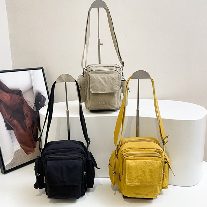 Hot Selling Waterproof Lightweight Nylon Women's New Outdoor Casual Shoulder Crossbody Multi-Pocket Camera Bag ddmymoon