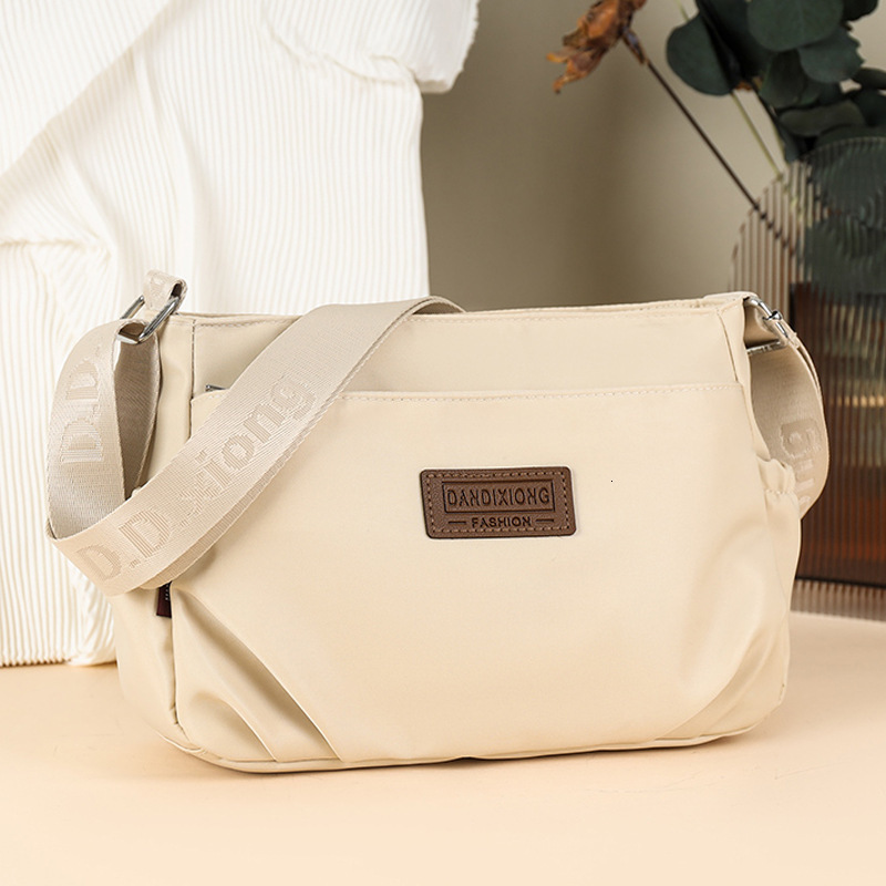 Waterproof Nylon Cloth Lightweight Casual Shoulder Women 2025 New Simple Multi-layer Large Capacity Crossbody Bag ddmymoon