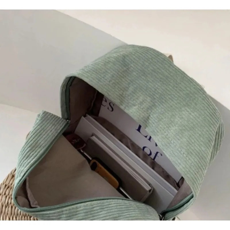 Korean version of the college style schoolbag largecapacity corduroy backpack junior high school womens outdoor l 250811