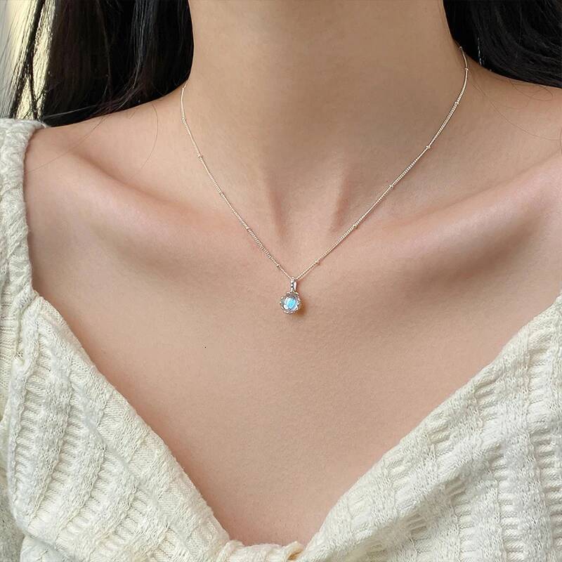 Popular sterling sier moonstone hollow necklace for women exquisite blue round pendant collarbone chain fashionable jewelr