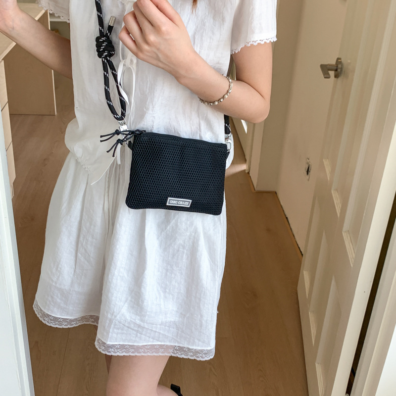 2025 New Simple Mesh Lightweight Women's Crossbody Korean and Japanese Style Casual Commuter Shoulder Bag ddmymoon